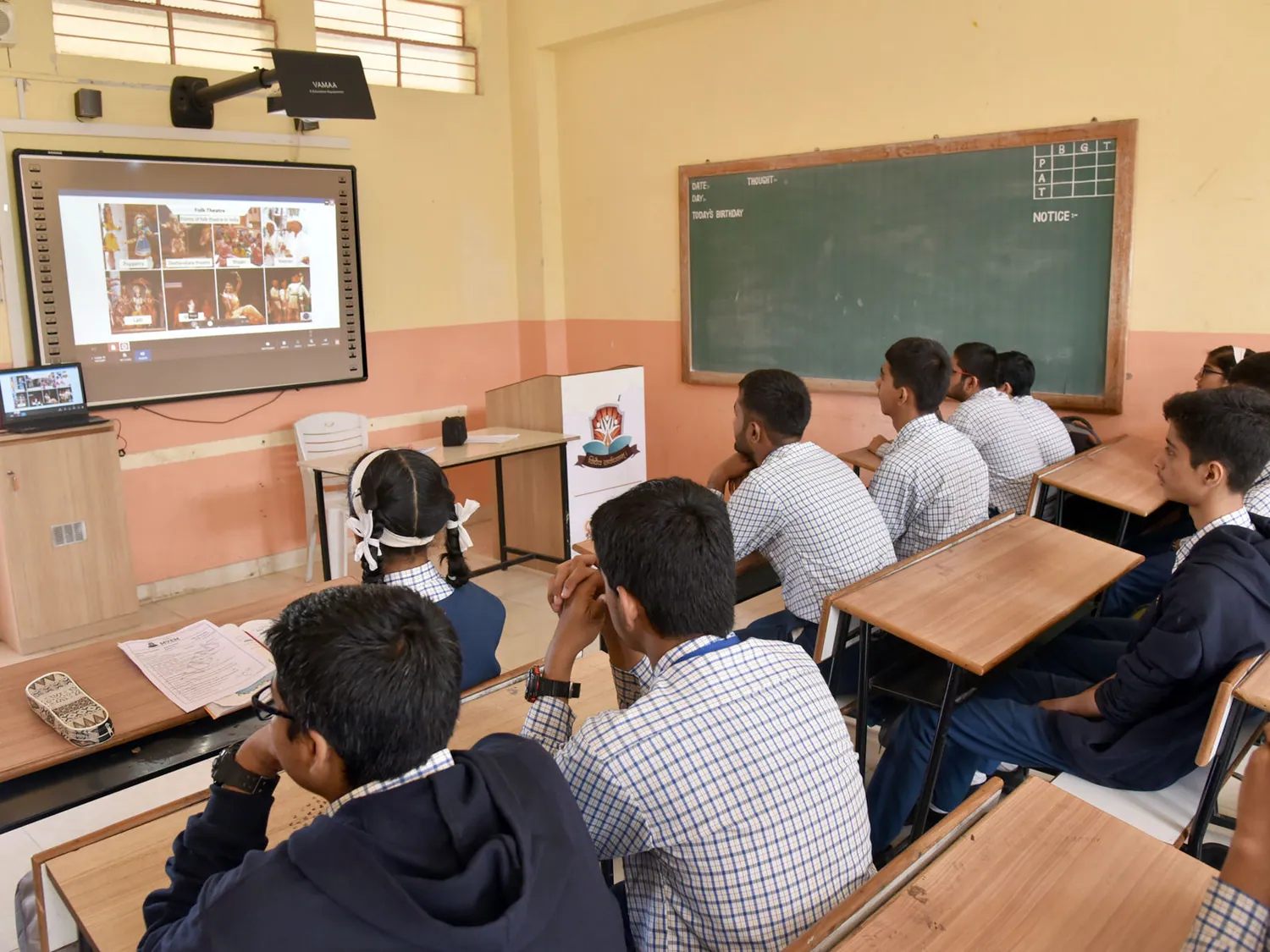 A digital smart classroom with an interactive board