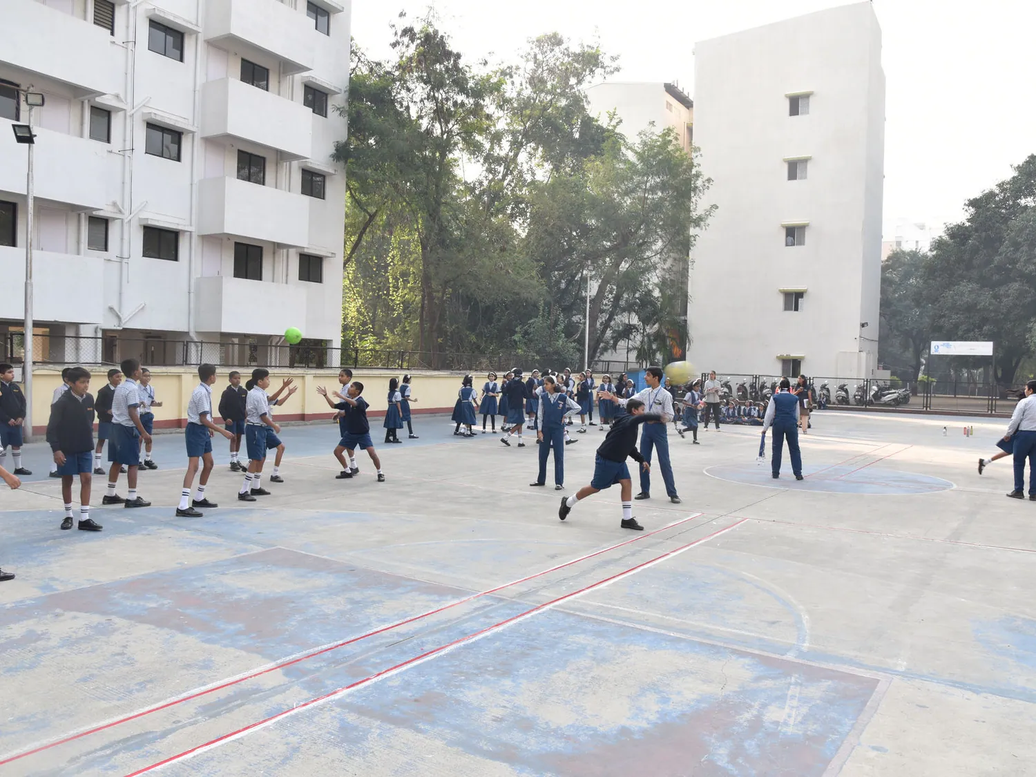 The sports court beside the school building
