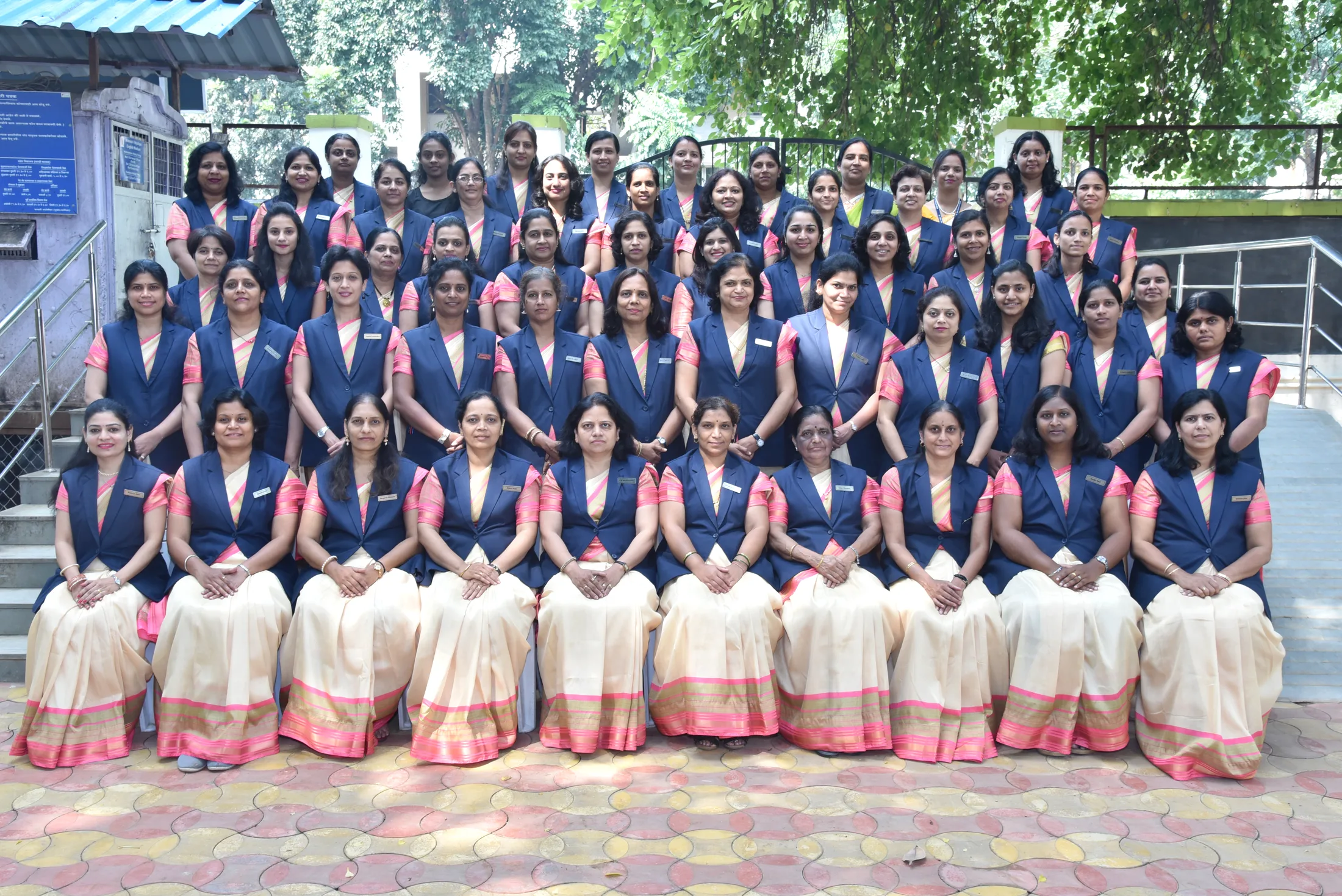 MVEM’s teachers gathered in rows for a group photograph