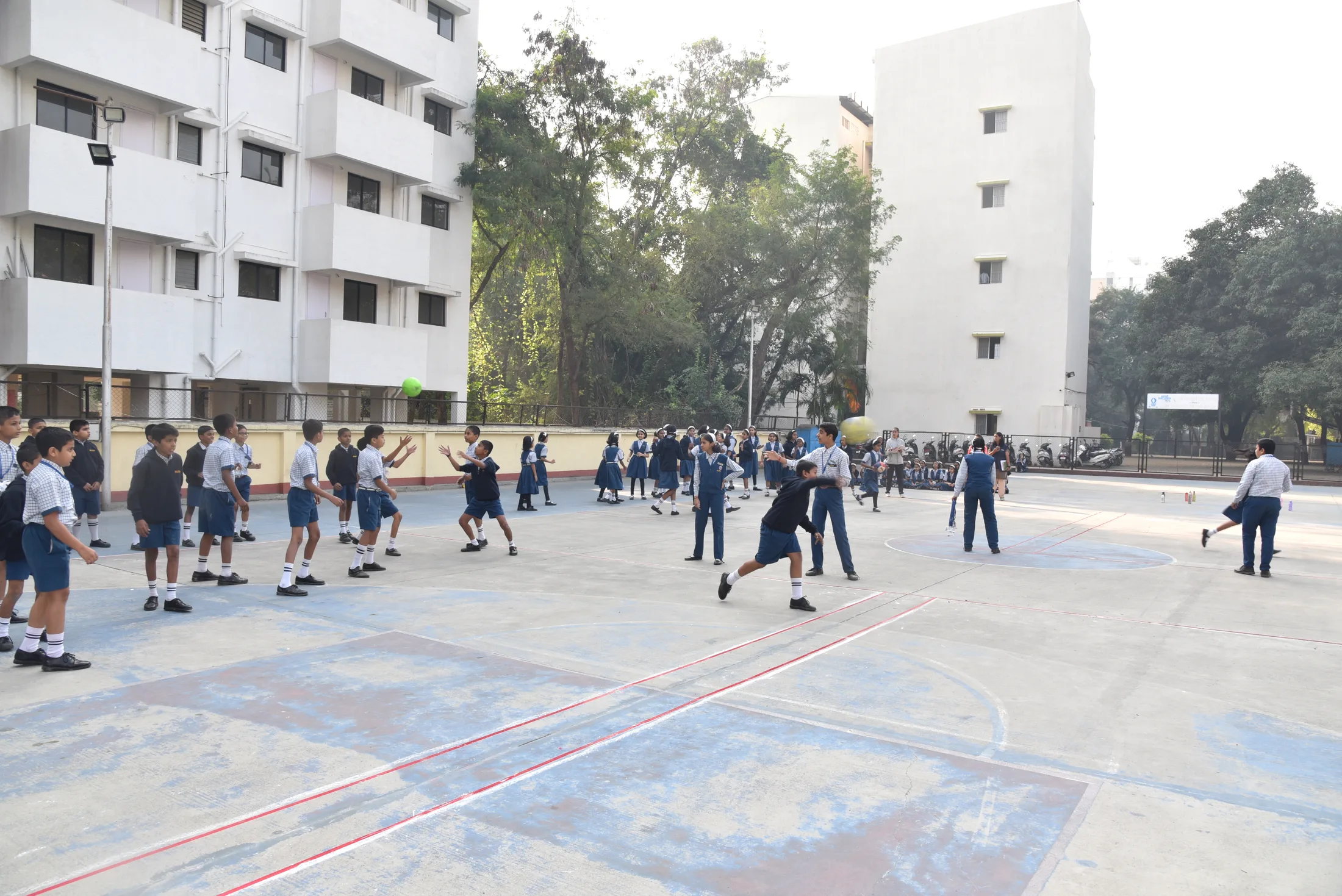 The sports court beside the school building